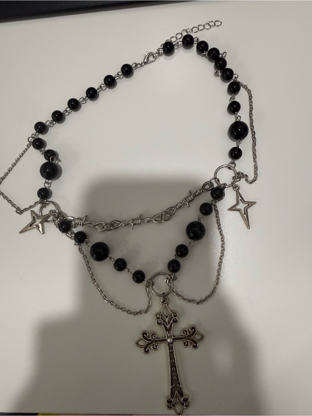 Unbranded silver cross necklace w/ black plastic beads + chains (read)